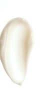 Creamy white cosmetic lotion or moisturizer smear isolated on white background for skincare and beauty product advertising.