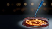 Laboratory petri dish with golden DNA helix spiral under scientific pipette for genetic research and biotechnology experiments in modern lab setting.