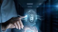 Businessman hand touching digital padlock icon with glowing security shield symbol, representing cybersecurity, data protection, and encrypted network technology for business solutions.