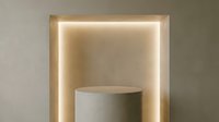 Minimalist concrete podium with warm LED backlit niche, neutral beige tones, elegant product display stand for luxury presentation.