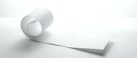 White paper roll unrolling on clean surface creating elegant minimalist composition for business presentations and office documentation needs.