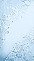 Frozen window glass with delicate ice crystals and frost patterns forming natural designs, isolated on white background, ready for winter, seasonal, and holiday design projects.
