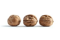 Three whole walnuts in shells arranged in a row on white background, showcasing natural texture and detail for food photography.