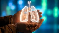 Human hands protecting glowing lungs hologram against blue medical background. Healthcare concept for respiratory system protection and pulmonology awareness.
