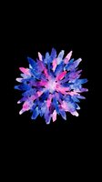 Vibrant watercolor starburst with radiating blue, pink, and purple brushstrokes on transparent background. Ready for t-shirts, stickers, clipart, and print-on-demand designs.