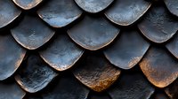 Weathered metal roof shingles with rust patina creating textured overlapping pattern for industrial architecture and construction backgrounds.
