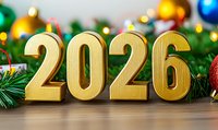 Golden numbers 2026 on wooden surface with Christmas decorations, colorful baubles and pine branches with bokeh lights creating festive holiday atmosphere.