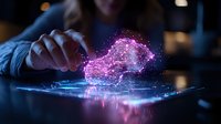 Glowing purple cloud computing hologram emerges from digital tablet surface in dark room, representing modern data storage and network technology solutions.