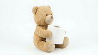Cute brown teddy bear holding white coffee mug on clean background for nursery decor, greeting cards, and children's product designs.