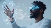 Young African American man with beard wearing futuristic glowing glasses interacts with holographic projection, digital particles floating around his hand in white t-shirt.