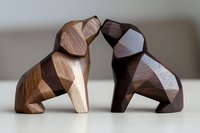 Geometric wooden dog figurines in light and dark wood facing each other, showcasing modern minimalist design with angular faceted surfaces. For home decor.