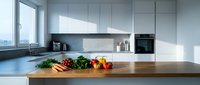 Modern white kitchen interior with wooden countertop and fresh vegetables for healthy cooking and meal preparation in contemporary home design.