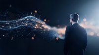 Businessman facing digital network visualization with glowing particles and connections against dark background, symbolizing technology innovation and digital transformation.