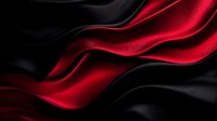 Flowing red and black silky fabric waves creating dynamic abstract background with elegant smooth curves and luxurious satin texture for design projects.
