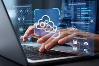 Business professional using laptop with holographic cloud computing interface displaying automation pipelines and integration systems for digital transformation.