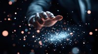 Mystical hand reaching out with glowing magical sparkles and light particles floating against dark background, creating ethereal atmosphere for spiritual concepts.