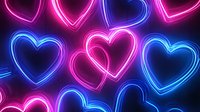 Glowing neon heart shapes in vibrant pink and blue colors on dark background create romantic atmosphere for Valentine's day cards and love themes.