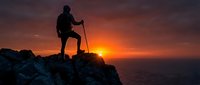 Silhouette of hiker with trekking poles standing on rocky mountain peak at sunset, celebrating achievement and outdoor adventure goals.