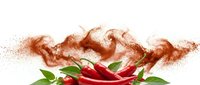 Fresh red chili peppers with vibrant powder explosion on white background, capturing spicy heat and bold flavor for food and culinary design.