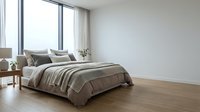 Modern bedroom with neutral bedding, wooden flooring, and large windows providing natural light. Suitable for interior design, home decor, and real estate marketing.