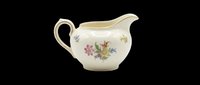 Vintage ceramic cream pitcher with floral motif, isolated on transparent background. Ready for design use on t-shirts, clipart, stickers, print-on-demand products, and sublimation projects.