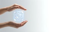 Female hands holding glowing digital heart symbol, representing care, protection, healthcare technology and wellness concepts for medical or charity applications.