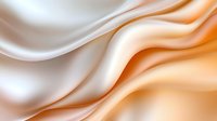Smooth flowing silk fabric with elegant waves in warm orange and cream tones creating luxurious textile background for premium design projects.