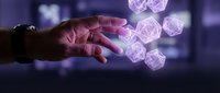 Hand reaching toward glowing purple geometric polygonal shapes floating in digital space representing futuristic technology and innovation concepts.