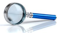 Elegant magnifying glass with blue metallic handle and silver rim on white background, useful for investigation, research, and detailed examination.