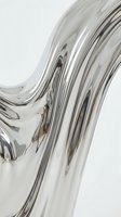 Liquid chrome metallic wave flowing with glossy reflections and smooth curves against white background, suitable for modern design and digital art projects.
