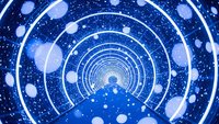Futuristic blue tunnel with glowing circular rings and floating particles creating depth perspective for sci-fi technology backgrounds.