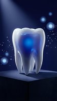 Glowing white tooth with blue energy core on platform against dark background with light effects for dental care and oral health concepts.