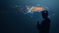 Silhouette of person holding glowing digital umbrella with network connections and light particles against dark background, cybersecurity concept.