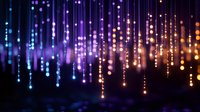 Magical glowing light strings with blue, purple and orange bokeh effect falling from above create dreamy atmosphere on dark background. Festive holiday backdrop.
