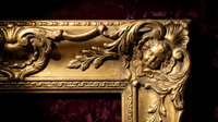 Ornate golden baroque frame corner with intricate carved details and decorative flourishes against rich burgundy velvet background for luxury interior design.