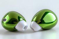Metallic green wireless earbuds with white tips on white background, modern audio technology design for mobile devices and smartphones.