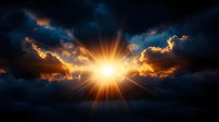 Dramatic sunset with bright sunburst breaking through dark storm clouds, creating golden rays against moody blue sky. Spiritual and inspirational background.