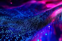 Abstract digital wave made of glowing particles in purple and pink neon colors creating futuristic data visualization background for technology presentations.