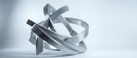 Abstract metallic ribbons twisted in dynamic sculptural form on white background for modern design projects and contemporary art concepts.