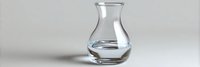 Clear glass vase with water on gray background, minimalist design showing liquid refraction and transparency, isolated product photography for commercial use.