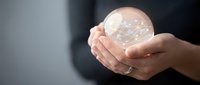 Hands holding transparent globe sphere with world map network, representing global business, international trade, and worldwide connectivity for corporate solutions.