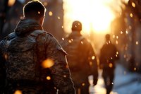 Military personnel silhouettes against dramatic sunset with sparks and bokeh effects in background, creating atmospheric combat scene with emotional depth.