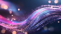 Magical glowing wave with sparkling particles in pink and blue colors against dark background, creating ethereal flowing light effect with bokeh elements.