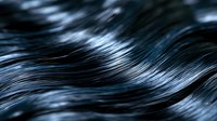 Close-up of flowing black hair strands with natural shine and movement, perfect for beauty and haircare concepts in advertising and design projects.