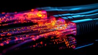 Glowing fiber optic cables transmit data with vibrant red and orange light streams against dark background, showcasing modern digital communication technology.