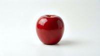Fresh red apple isolated on white background for healthy eating and nutrition concepts.