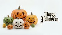 Carved jack-o-lantern pumpkins and gourds in various sizes with glowing faces arranged on white background for seasonal holiday celebrations and decorations.