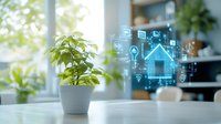 Smart home hologram with connected IoT devices and wireless technology icons floating above desk with green plant in modern interior workspace.