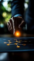 Male hand touching glowing network connection points on dark surface, representing digital transformation and business process automation technology.