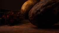 Dark chocolate truffles with cocoa powder dusting on rustic wooden surface in moody lighting, creating rich textures and shadows for gourmet food photography.